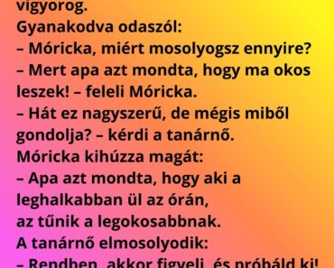 A tanárnő bejön az órára, és látja, hogy Móricka hátul ül, nagyon vigyorog.