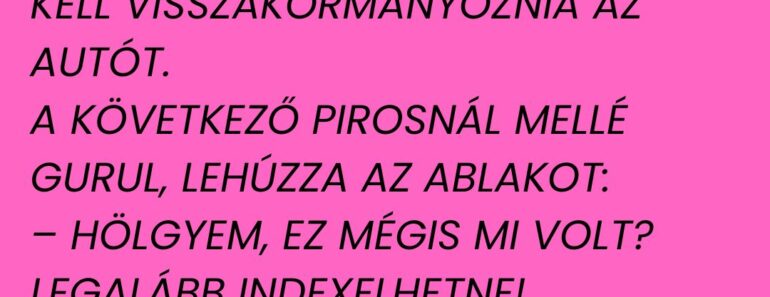 Egy férfi nyugodtan autózik a városban