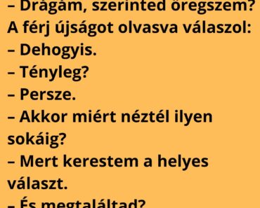 A feleség reggel a tükör előtt áll: